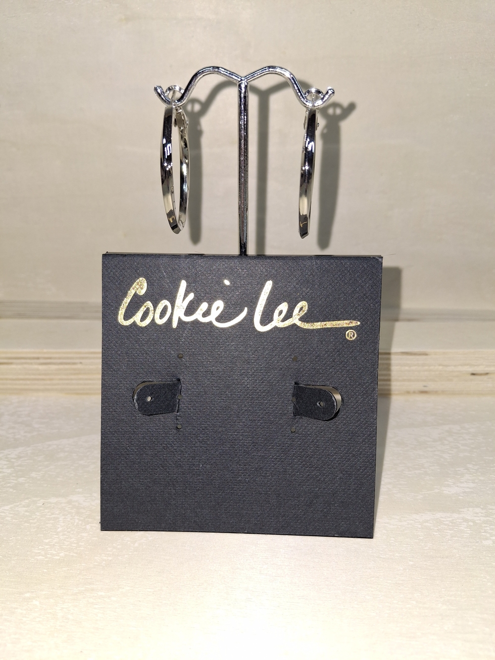 Cookie Lee Shiny Silver Twisted Hoop Earrings
